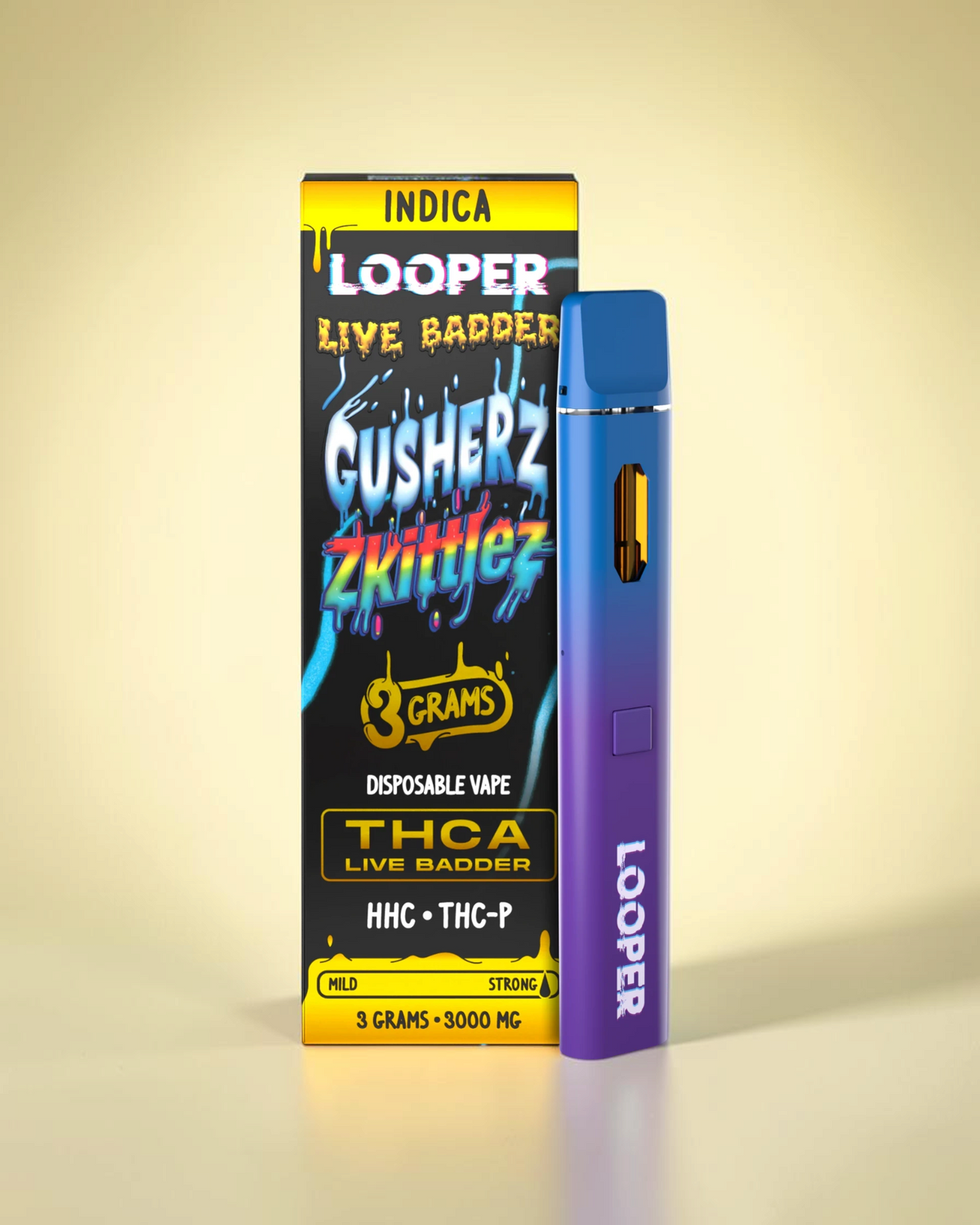 Vaporizador desechable Mi tienda Looper XL de 3 gramos con acabado degradado azul y violeta y empaque Gusherz Zkittlez